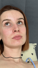 Woman documents skincare routine with pets in Chaikovsky home