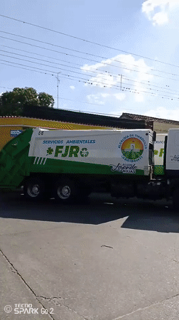 Municipal ceremony features decorated garbage trucks in Tinaquillo, Venezuela