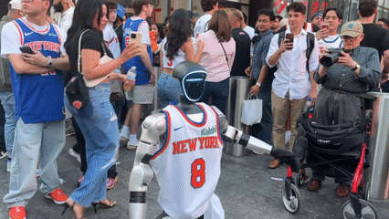 Robot in Knicks Jersey Draws Crowds Near Penn Station