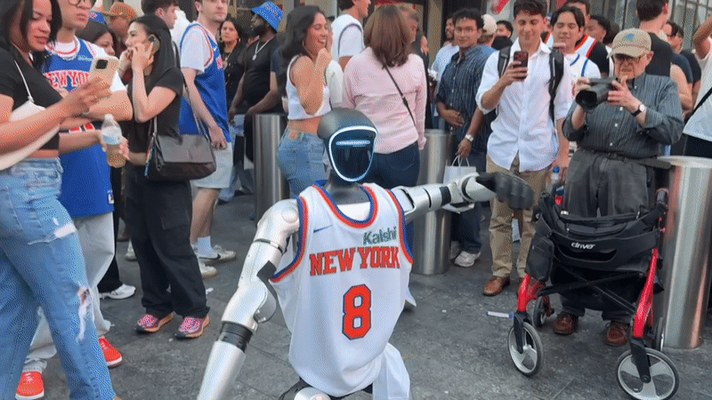 Robot in Knicks Jersey Draws Crowds Near Penn Station