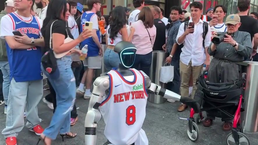 Robot in Knicks Jersey Draws Crowds Near Penn Station