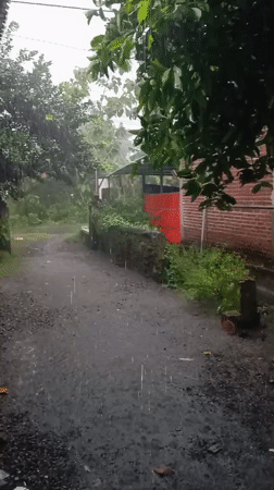 Heavy rainstorm hits rural Baron, Indonesia