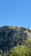 Medieval castle ruins documented on hillside in Montenegro