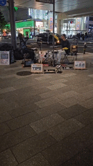 Street performers entertain crowds in busy Osaka shopping district