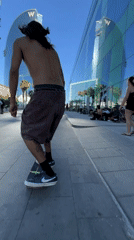 Skateboarding Barcelona's beachfront promenade on a sunny afternoon
