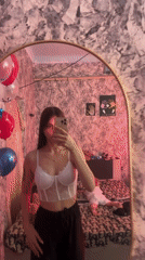 Woman takes selfie in decorated room in Moldova