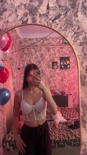 Woman takes selfie in decorated room in Moldova