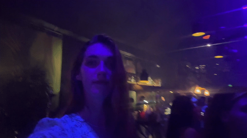 Nightclub scene captured in บ้านบางรักษ์ with DJ, dancing patrons