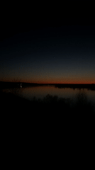 Twilight landscape captured in Ольховка, Russia shows evening sky reflection