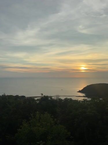 Golden sunset captured over Thai coastal bay from multiple viewpoints