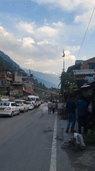Ordinary street life documented across Manali during busy morning hours