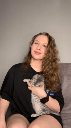 Afternoon at home in Moscow with a grey tabby kitten