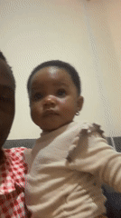 Father and baby share quiet afternoon moments in Jos home