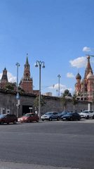 Artist paints outdoors near Moscow's Kremlin wall