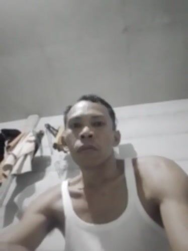 Man records himself in bedroom in Bukit Ketok Indonesia