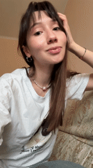 Young woman poses casually for photo in Kazan