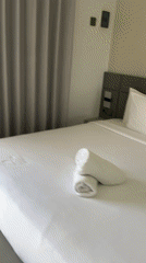 Minimalist hotel room with jungle balcony views in Penebel, Bali
