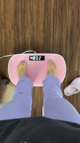 Person exercises on vibration plate in Seal Beach
