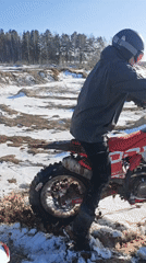 Motorcyclist takes selfies during winter ride in Russian countryside