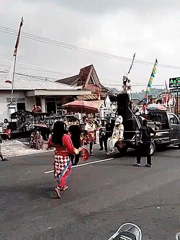 Colorful street parade winds through Tawangmangu with eclectic costumes