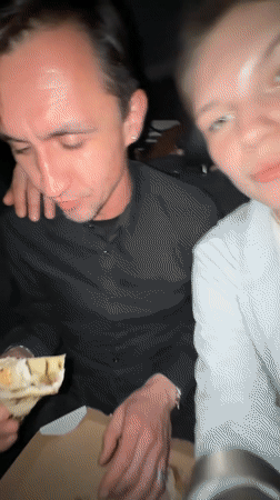 Group shares meal inside car in Serbian municipality