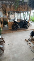 Chained motorcycle parked at Vietnam motorcycle cafe