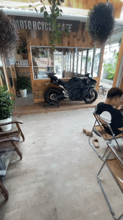 Chained motorcycle parked at Vietnam motorcycle cafe