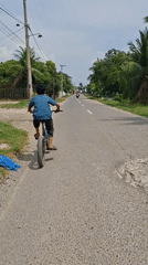 Morning life captured across Indonesian towns: cycling, markets, coffee