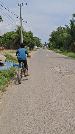 Morning life captured across Indonesian towns: cycling, markets, coffee