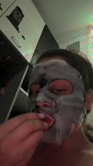 Person enjoys skincare routine with face mask in Varna