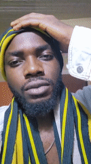 Portrait session with bearded man in traditional dress documented in Jos