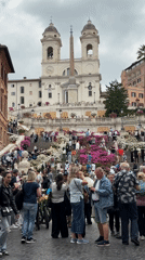Tourist crowds pack Rome's Spanish Steps on Tuesday morning
