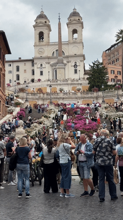 Tourist crowds pack Rome's Spanish Steps on Tuesday morning