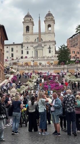 Tourist crowds pack Rome's Spanish Steps on Tuesday morning