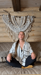 Woman seated on couch observed in Tyulyuk, Russia