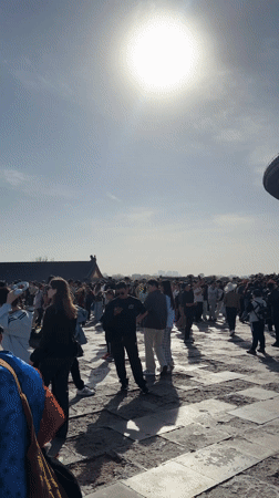 Crowds gather at Beijing's Temple of Heaven under clear skies