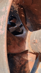 Metalworker repairs ship propeller in Russian coastal town