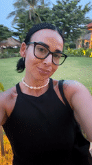 Woman documents evening at Indonesian luxury resort during dusk