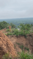 Red truck, observers gather at quarry site in Achara