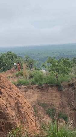 Red truck, observers gather at quarry site in Achara
