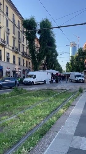 Milan street scene shows overgrown tram tracks