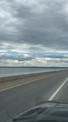 Rolling past a vast river on the roads of Chaikovsky
