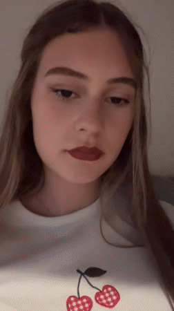 Woman poses for casual photos on couch in Pazardzhik