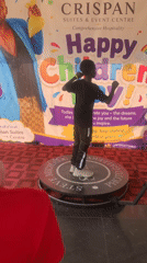 Children celebrate at photo booth during Children's Day event