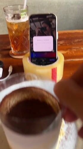 Morning street life and cafe culture documented in Denpasar