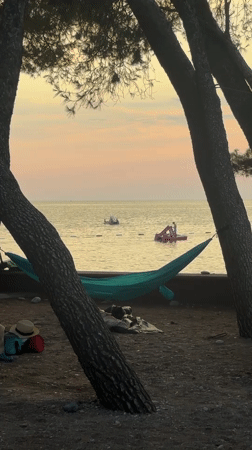 Sunset on the Adriatic: beach and water activity in Bar, Montenegro