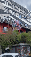 Distinctive striped building with red accents documented in Moscow