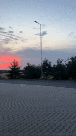 Warehouse shift ends under a vivid Czech summer sunset