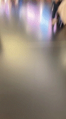 Skateboarder spotted rolling through Spanish airport terminal