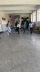 Young people dancing casually indoors in Kocherinovo, Bulgaria